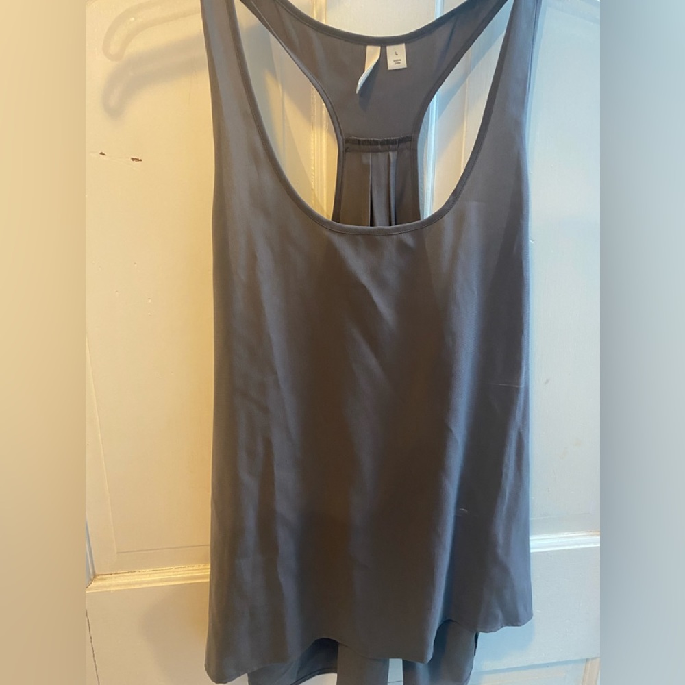 Two racer back tanks. Gray and beige.